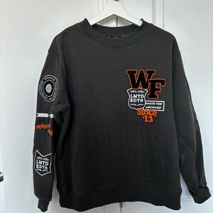 White Fox Boutique Black and Orange Graphic Sweatshirt